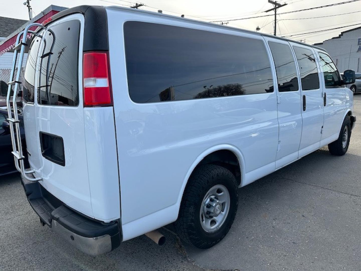 2017 White Chevrolet Express LT 3500 Extended (1GAZGPFG5H1) with an 6.0L V8 OHV 16V FFV engine, 6A transmission, located at 3200 1st Avenue North, Billings, MT, 59101, (406) 245-9055, 45.779270, -108.510742 - Off-Lease Lease Unit with Great Maintenance Records! 15 Passenger Van with LT Package, Towing, Tilt Steering, Cruise Control, Rear Air, Rear Heat, Factory Tinted Glass, Dual Power Seats and Much More! CarFax Dealer. Auto Brokers of Montana/AA&A Auto Rental/Fox Car Rental - Photo#4